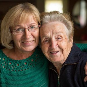Woman Visiting Elderly Woman