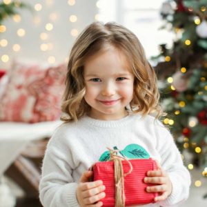 Child with Christmas Gift