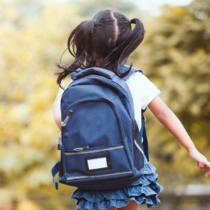 Girl with Blue Backpack